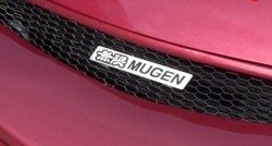 Эмблема (шильдик) решетки радиатора Mugen Mitsubishi Lancer 10 седан дорестайлинг (2007-2010)