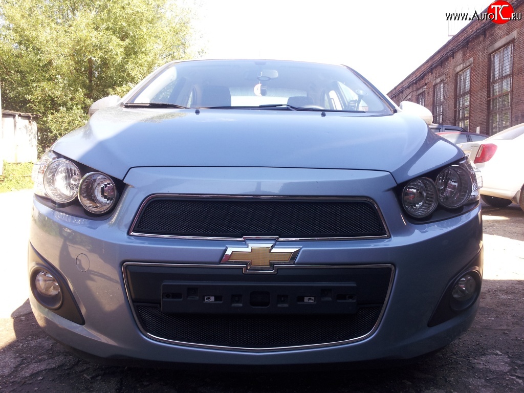 1 469 р. Нижняя сетка на бампер Russtal (черная) Chevrolet Aveo T300 седан (2011-2015)  с доставкой в г. Таганрог