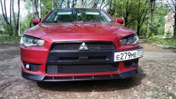 899 р. Вставка переднего бампера (зубатка) Evo  Mitsubishi Lancer  10 (2007-2017) седан дорестайлинг, хэтчбэк дорестайлинг, седан рестайлинг, хэтчбек 5 дв рестайлинг (Неокрашенная)  с доставкой в г. Таганрог. Увеличить фотографию 7