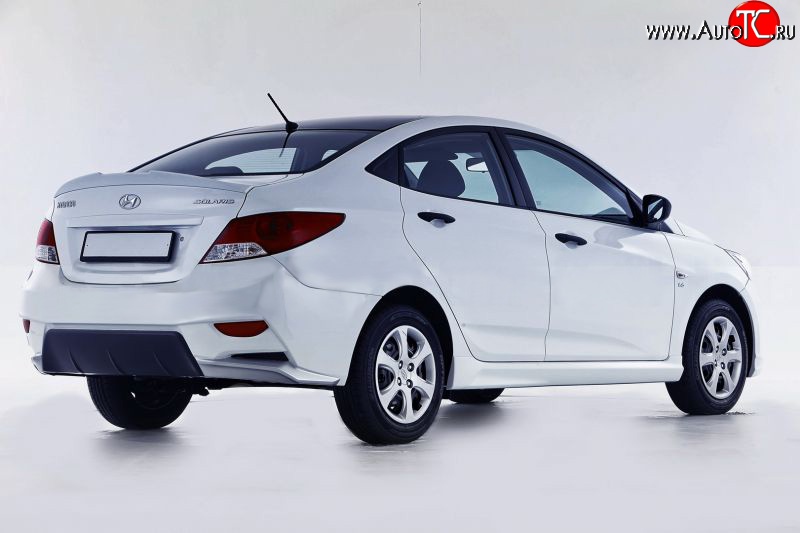 14 499 р. Задний бампер Sport Hyundai Solaris RBr седан дорестайлинг (2010-2014) (Неокрашенный)  с доставкой в г. Таганрог