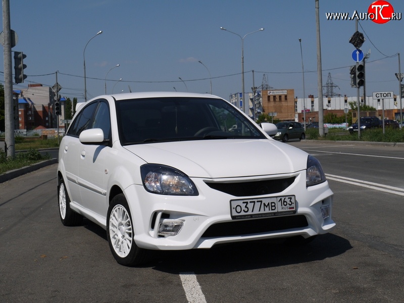 10 999 р. Передний бампер Vita Dm  KIA Rio ( 2 JB,  4 FB) (2005-2024) дорестайлинг седан, дорестайлинг, хэтчбэк 5 дв., рестайлинг, хэтчбэк 5 дв., рестайлинг седан (Без сетки, Неокрашенный)  с доставкой в г. Таганрог