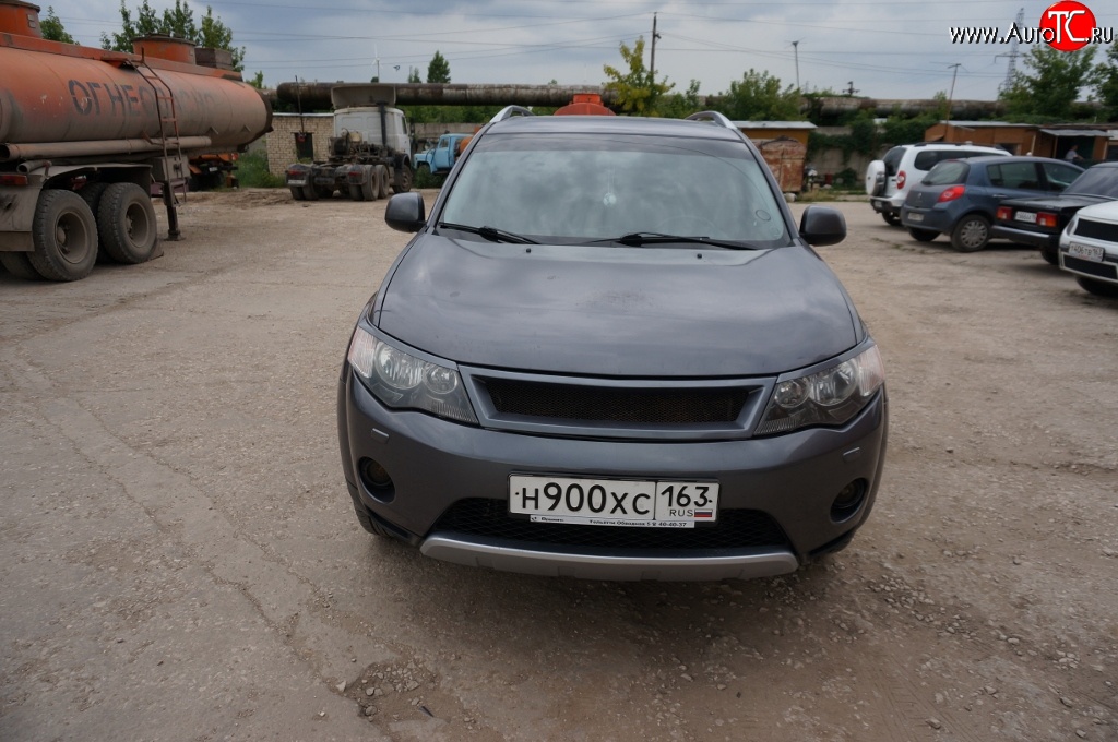 5 449 р. Решётка радиатора (рестайлинг) Sport Mitsubishi Outlander XL (CW)  рестайлинг (2010-2013) (Неокрашенная)  с доставкой в г. Таганрог