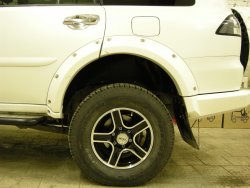 15 349 р. Накладки на колёсные арки BUSHWACKER Mitsubishi Pajero Sport PB дорестайлинг (2008-2013) (Неокрашенные)  с доставкой в г. Таганрог. Увеличить фотографию 3