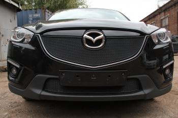 799 р. Зимняя заглушка решетки радиатора (с парктроником) PREMIUM Стрелка11 Mazda CX-5 KE дорестайлинг (2011-2014) (черная)  с доставкой в г. Таганрог. Увеличить фотографию 2